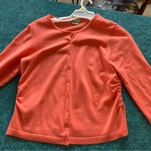 Bright coral lightweight button up sweater with 3/4 sleeve and scrunched sides